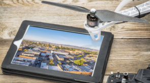 Image of a drone and and ipad showing the image that has been taken