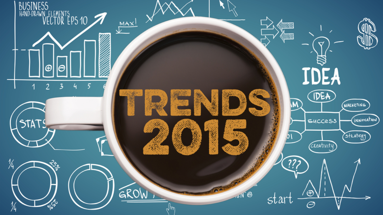 Image of a coffee mug over top of a blueprint with the words Trends 2015